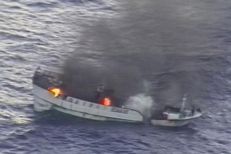 4-23-2012 PHOTO Ten Fishermen Rescued from Burning Vessel in Pacific.jpg